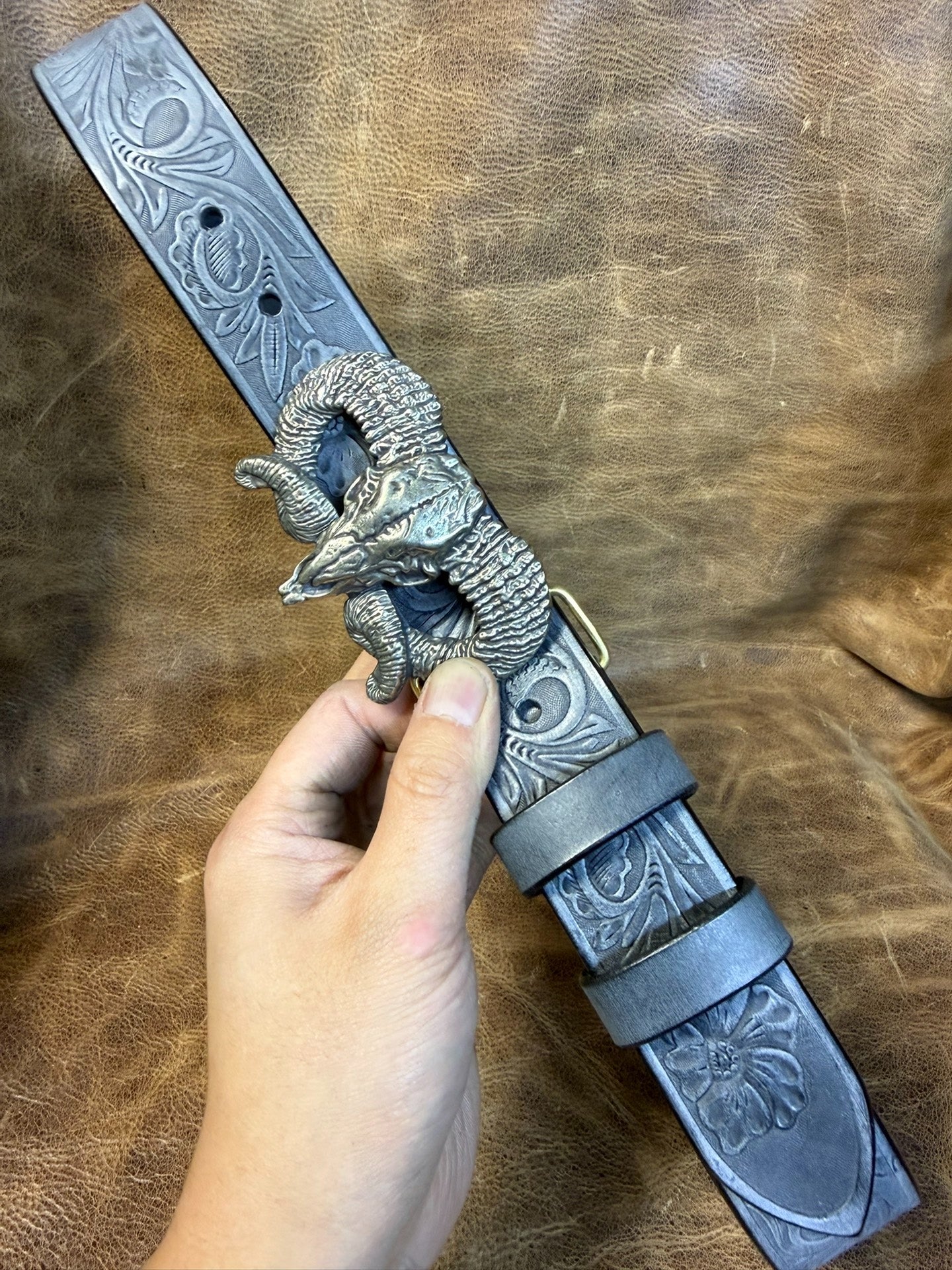 The Italian horse-rein carved handmade belt is custom-made
