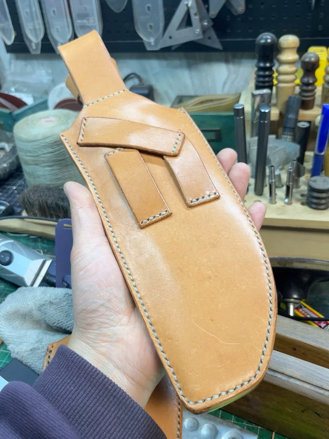 The cowhide scabbard is custom-made and handmade. The customer need…