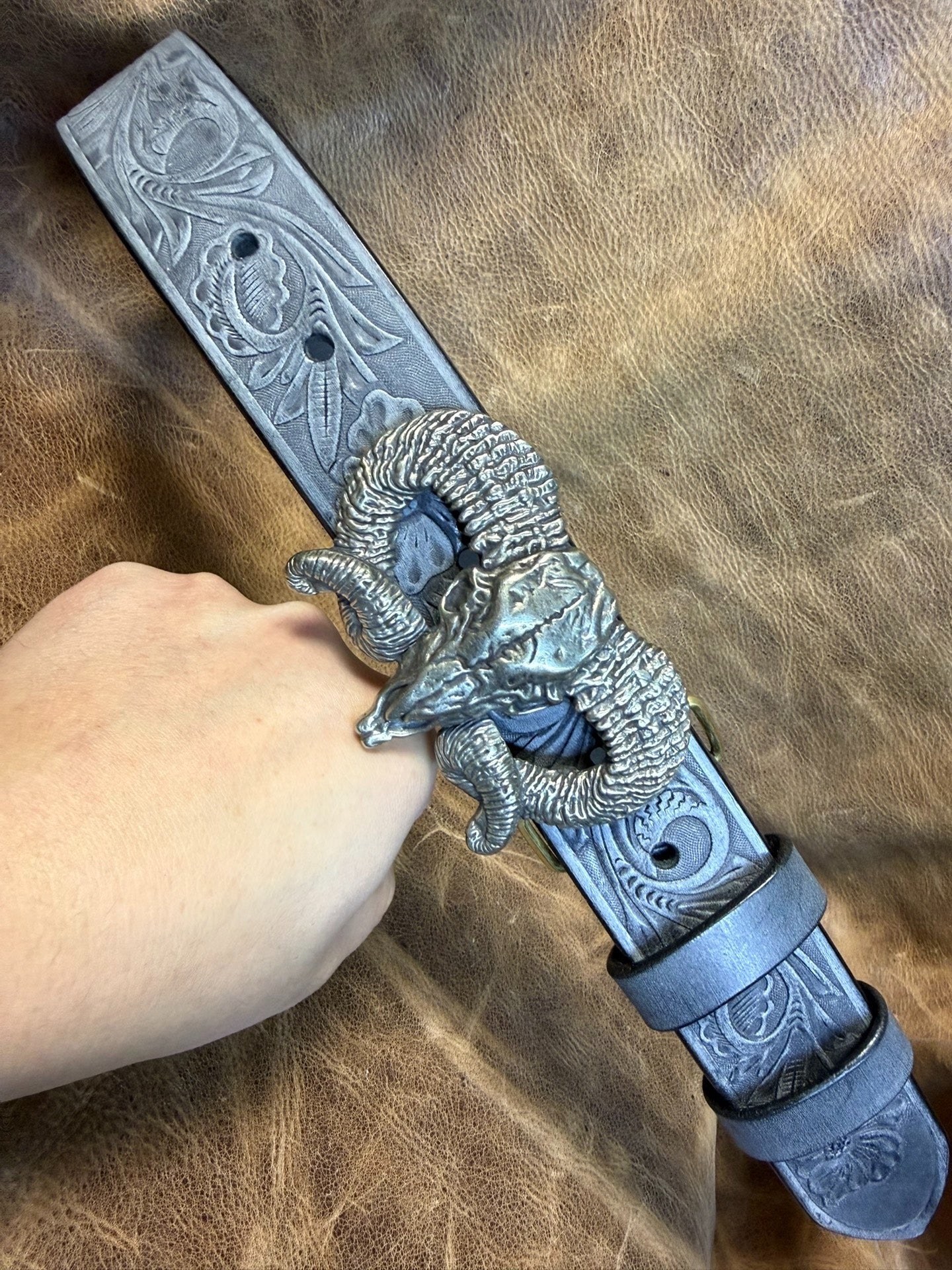 The Italian horse-rein carved handmade belt is custom-made