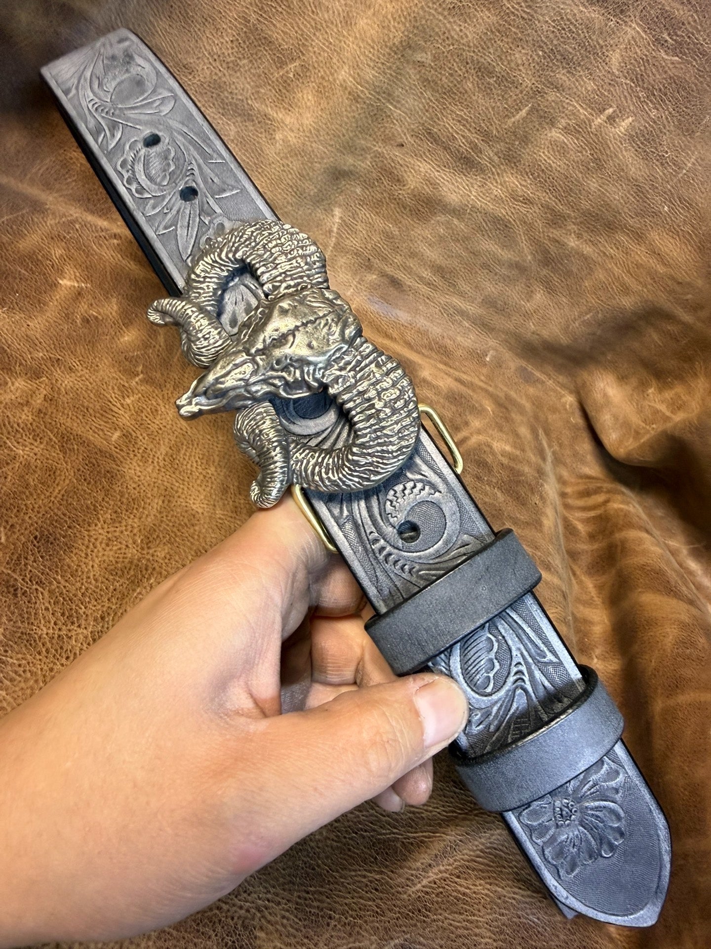 The Italian horse-rein carved handmade belt is custom-made