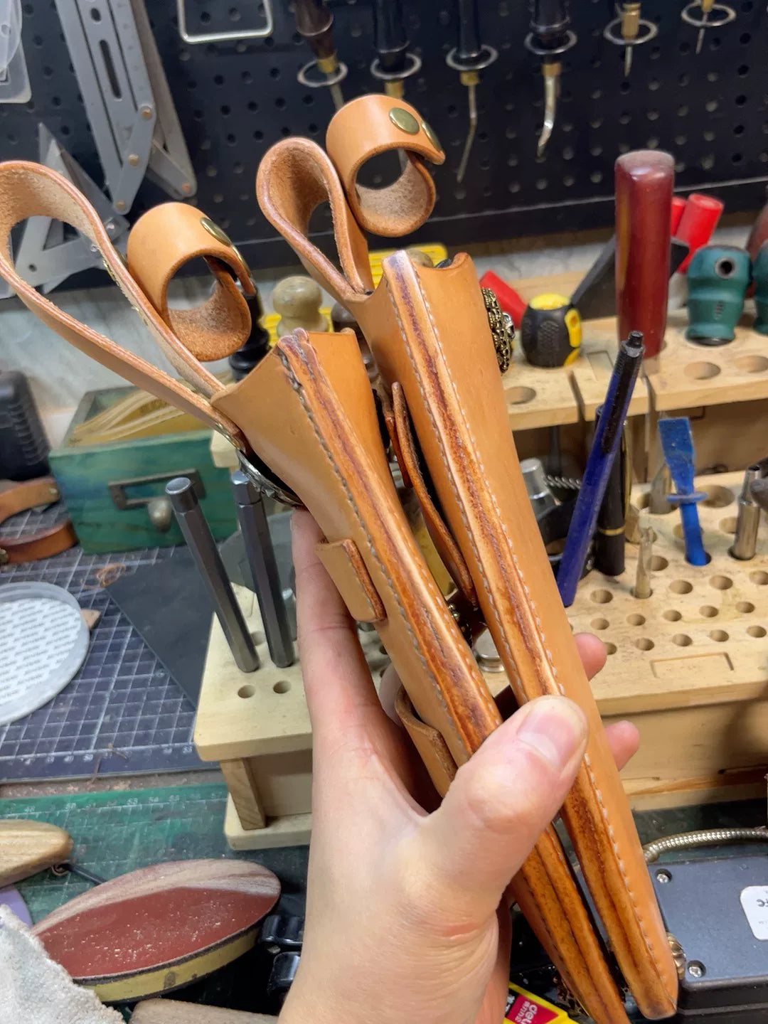 The cowhide scabbard is custom-made and handmade. The customer need…