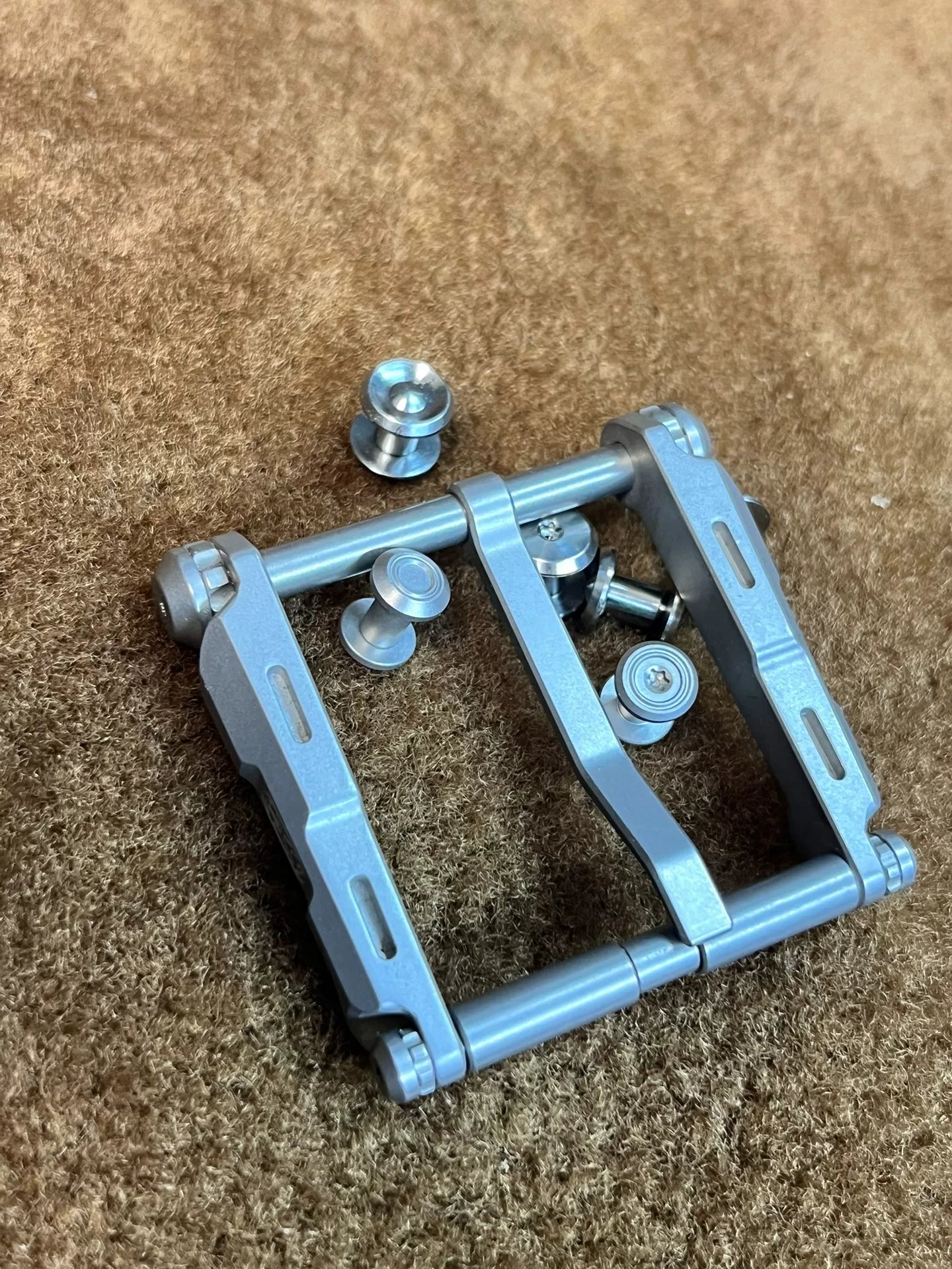 West Wind Tunnel titanium alloy belt buckle, hypoallergenic material