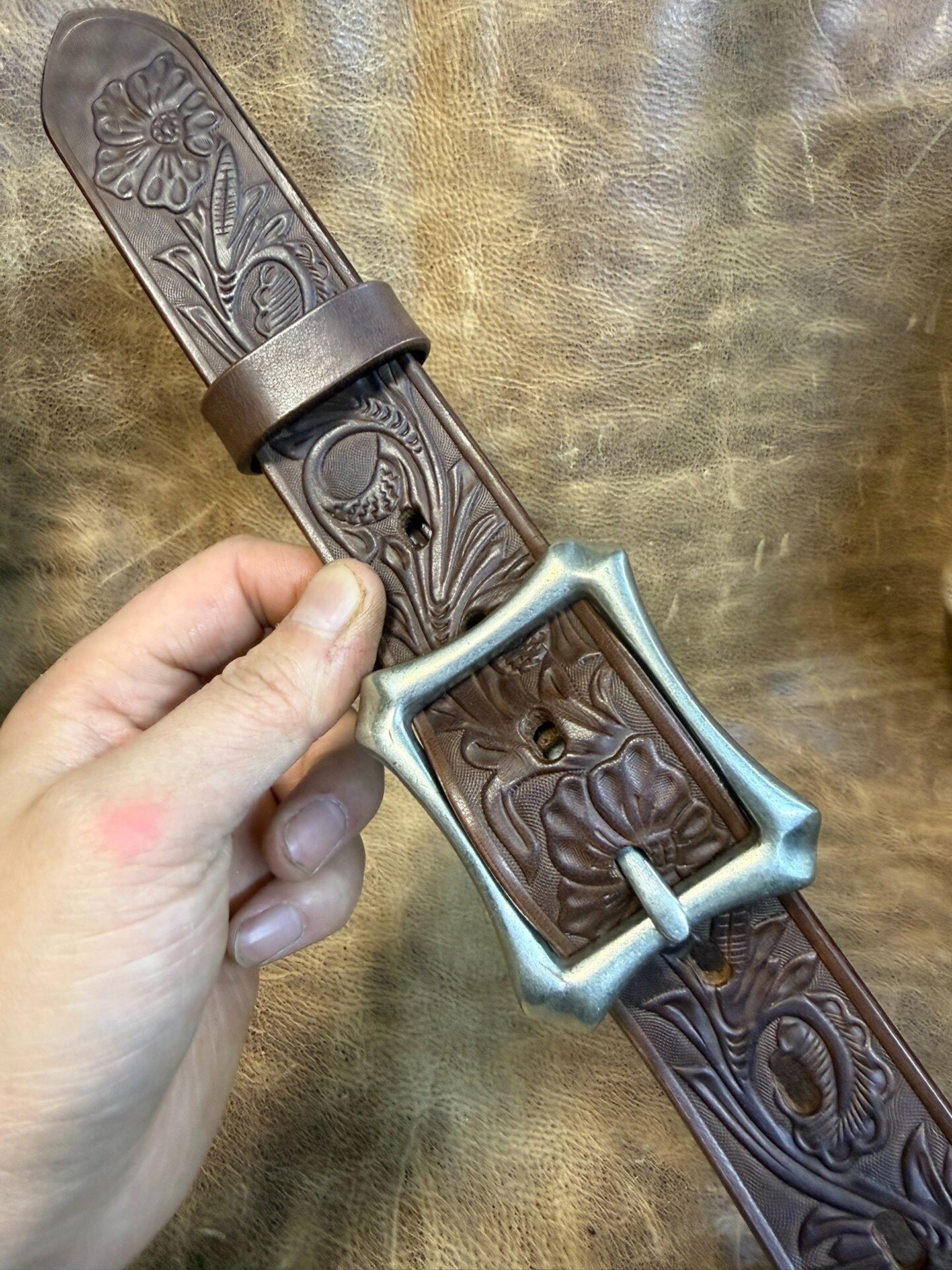 Meian's custom-made brown carved handmade belt