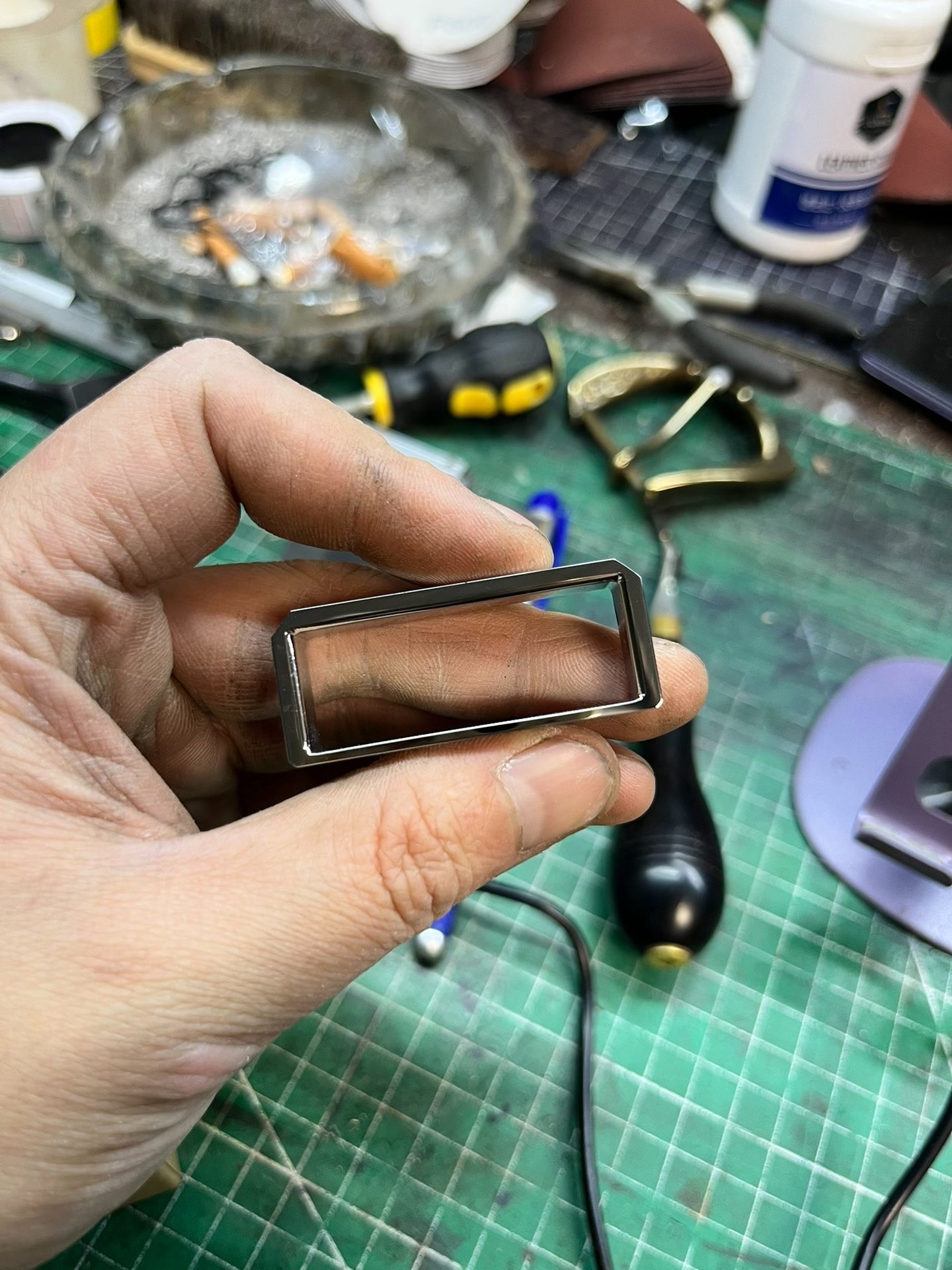 Muchen belt buckle meson