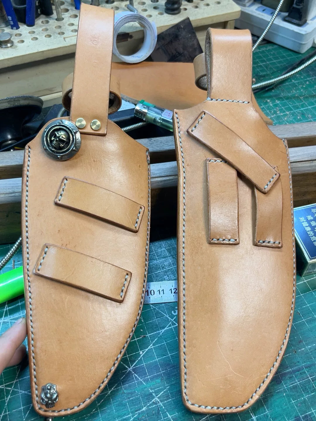 The cowhide scabbard is custom-made and handmade. The customer need…