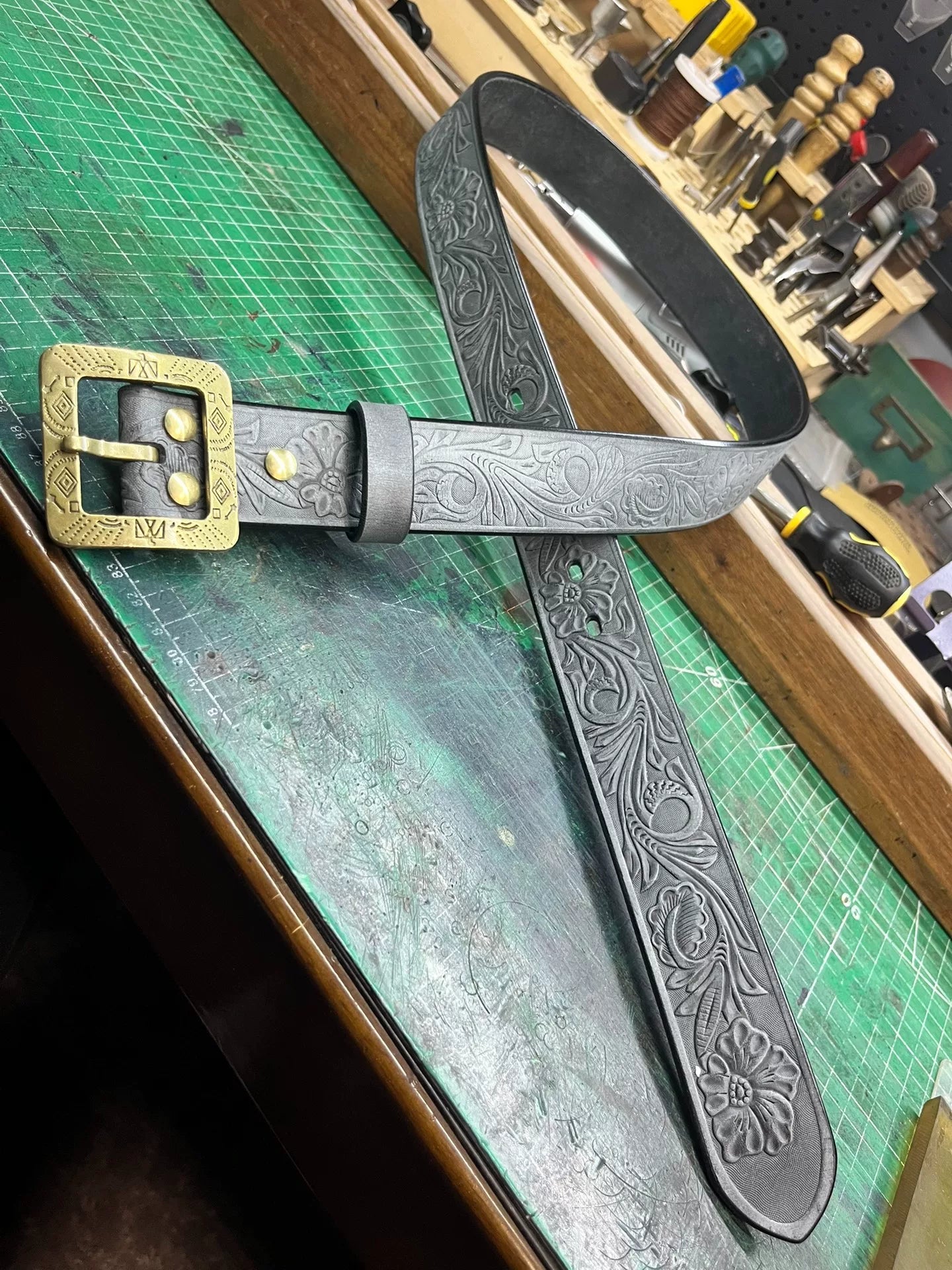 The machine-carved handmade belt of Italian horse-bridle leather is…
