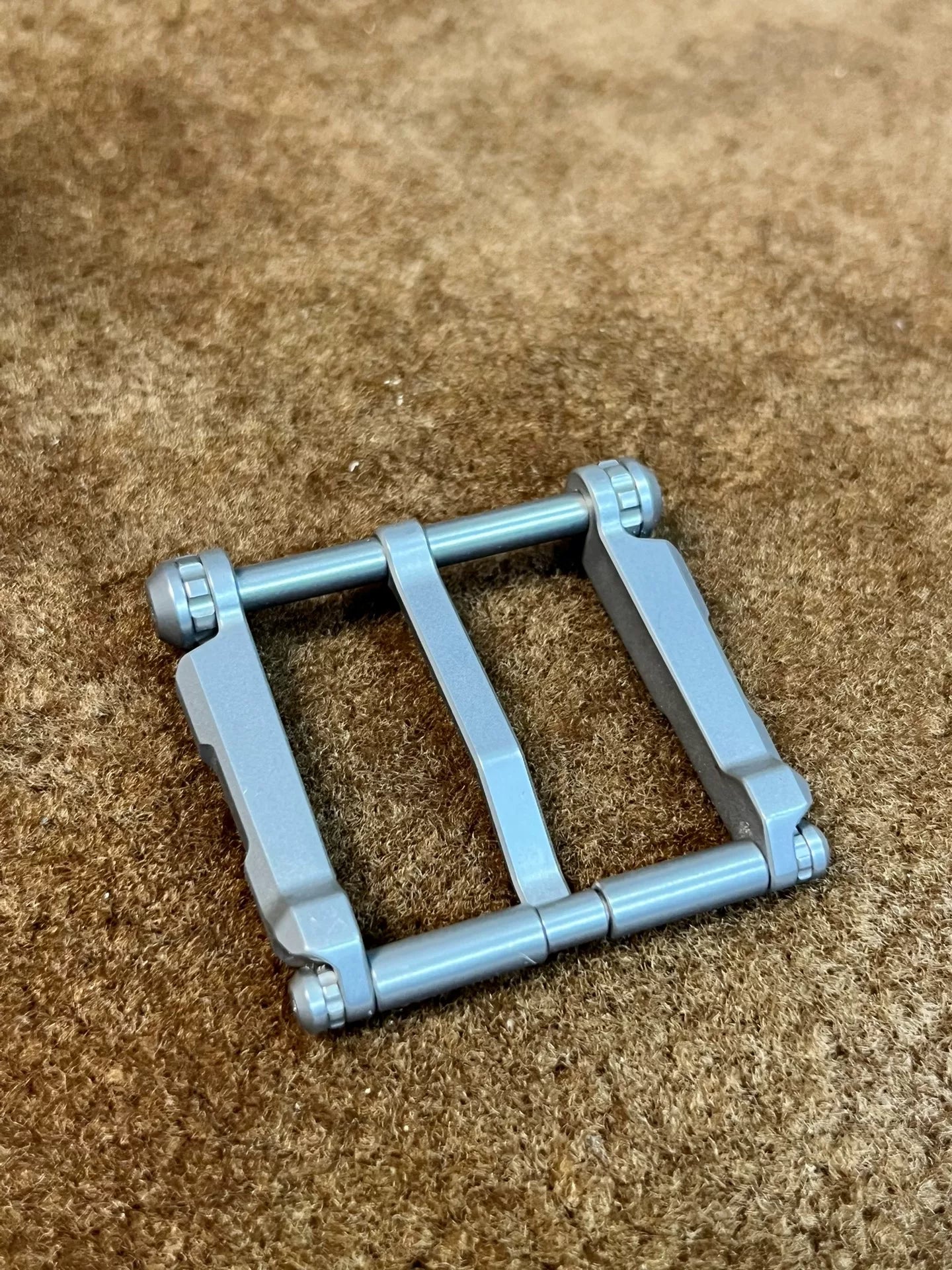 West Wind Tunnel titanium alloy belt buckle, hypoallergenic material