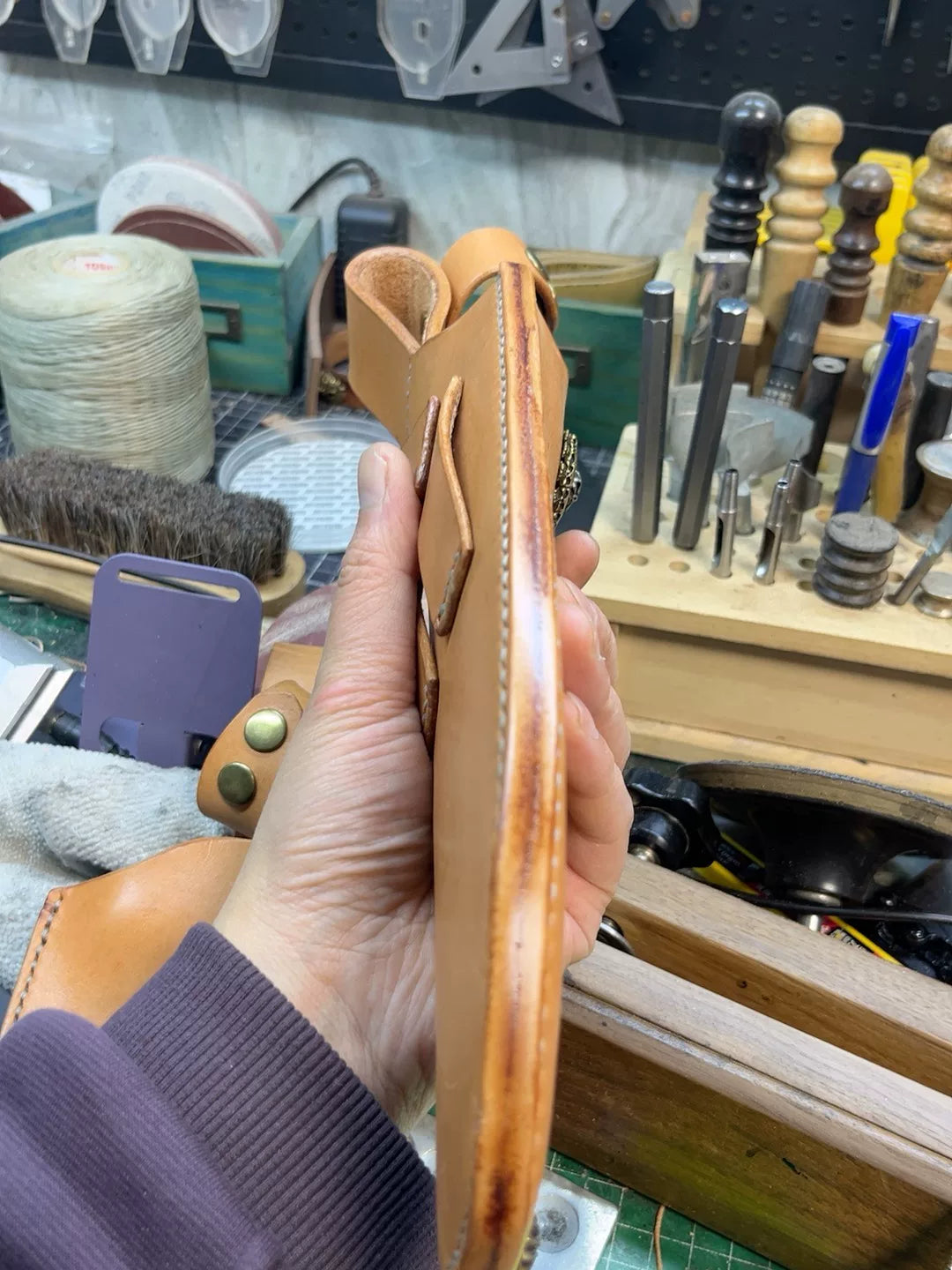 The cowhide scabbard is custom-made and handmade. The customer need…