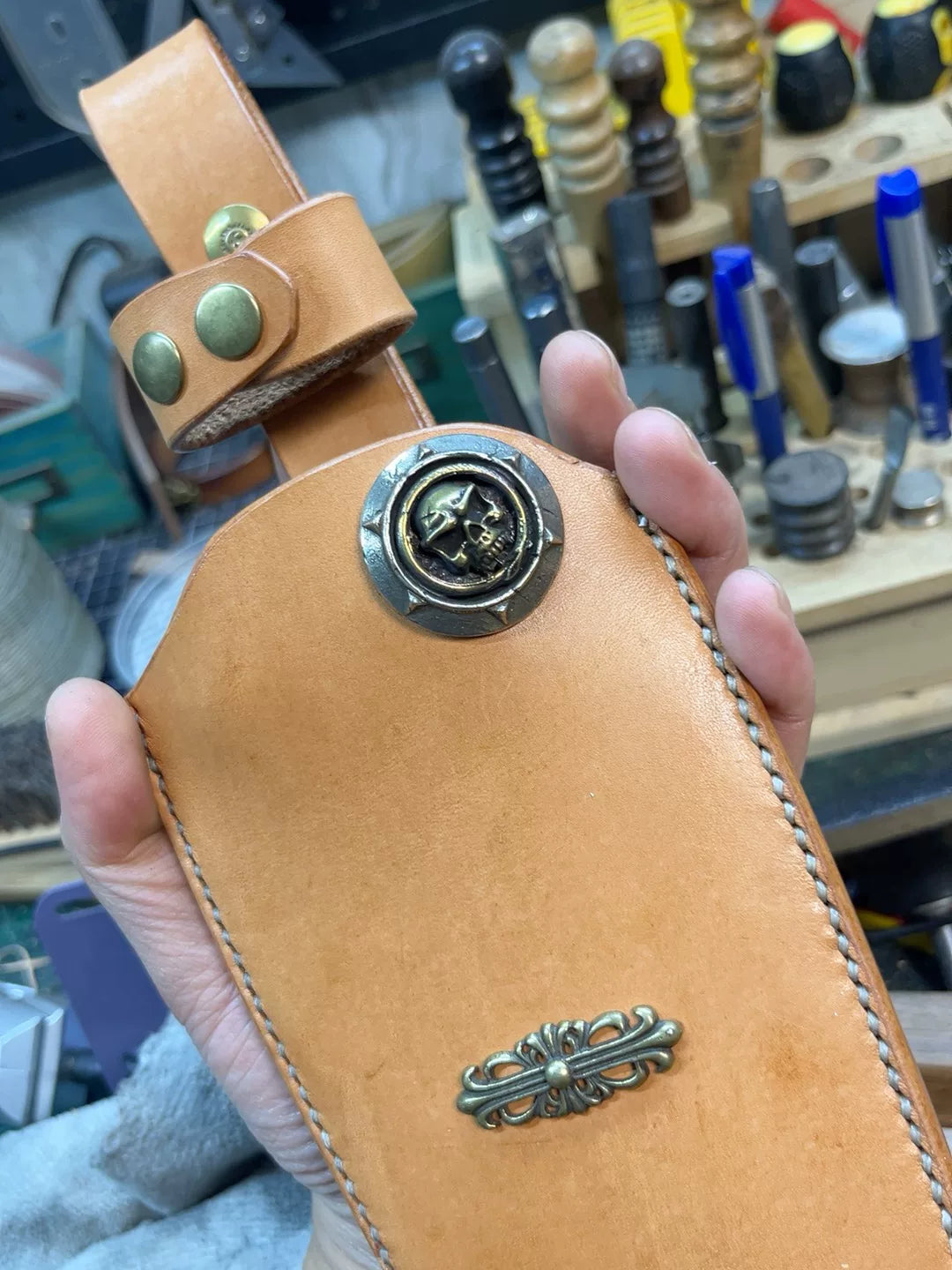 The cowhide scabbard is custom-made and handmade. The customer need…