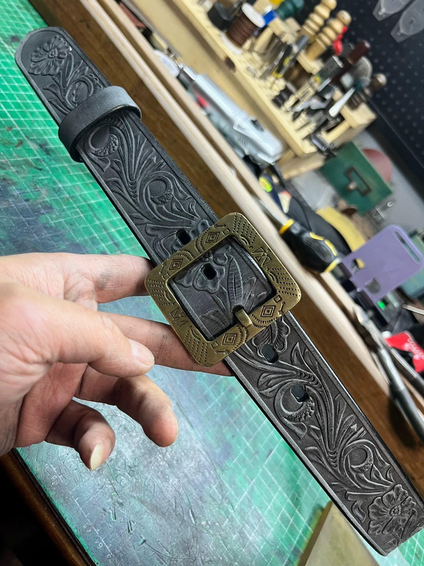 The machine-carved handmade belt of Italian horse-bridle leather is…
