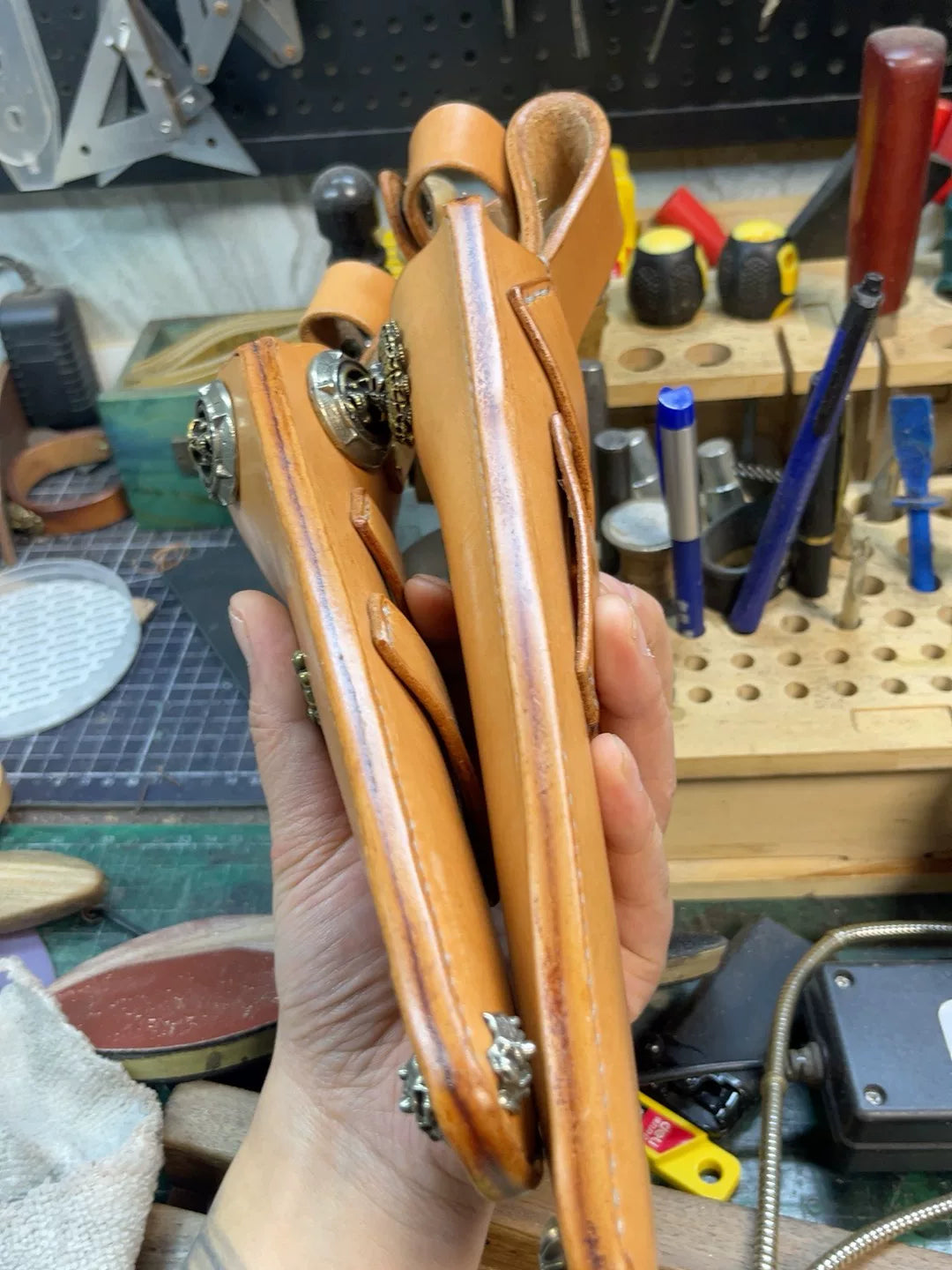 The cowhide scabbard is custom-made and handmade. The customer need…