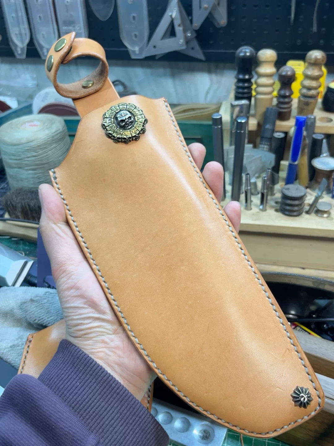 The cowhide scabbard is custom-made and handmade. The customer need…