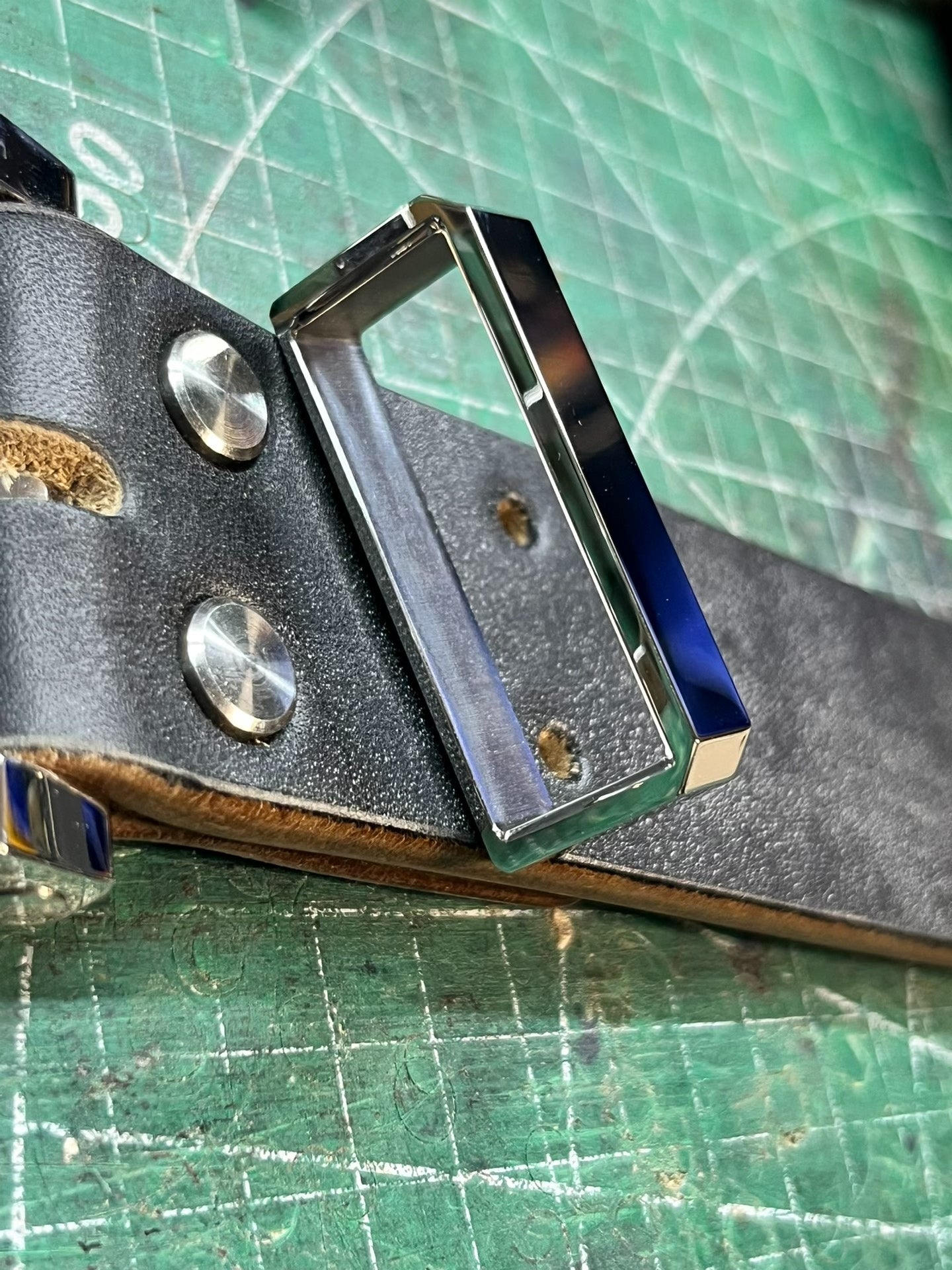 Muchen belt buckle meson