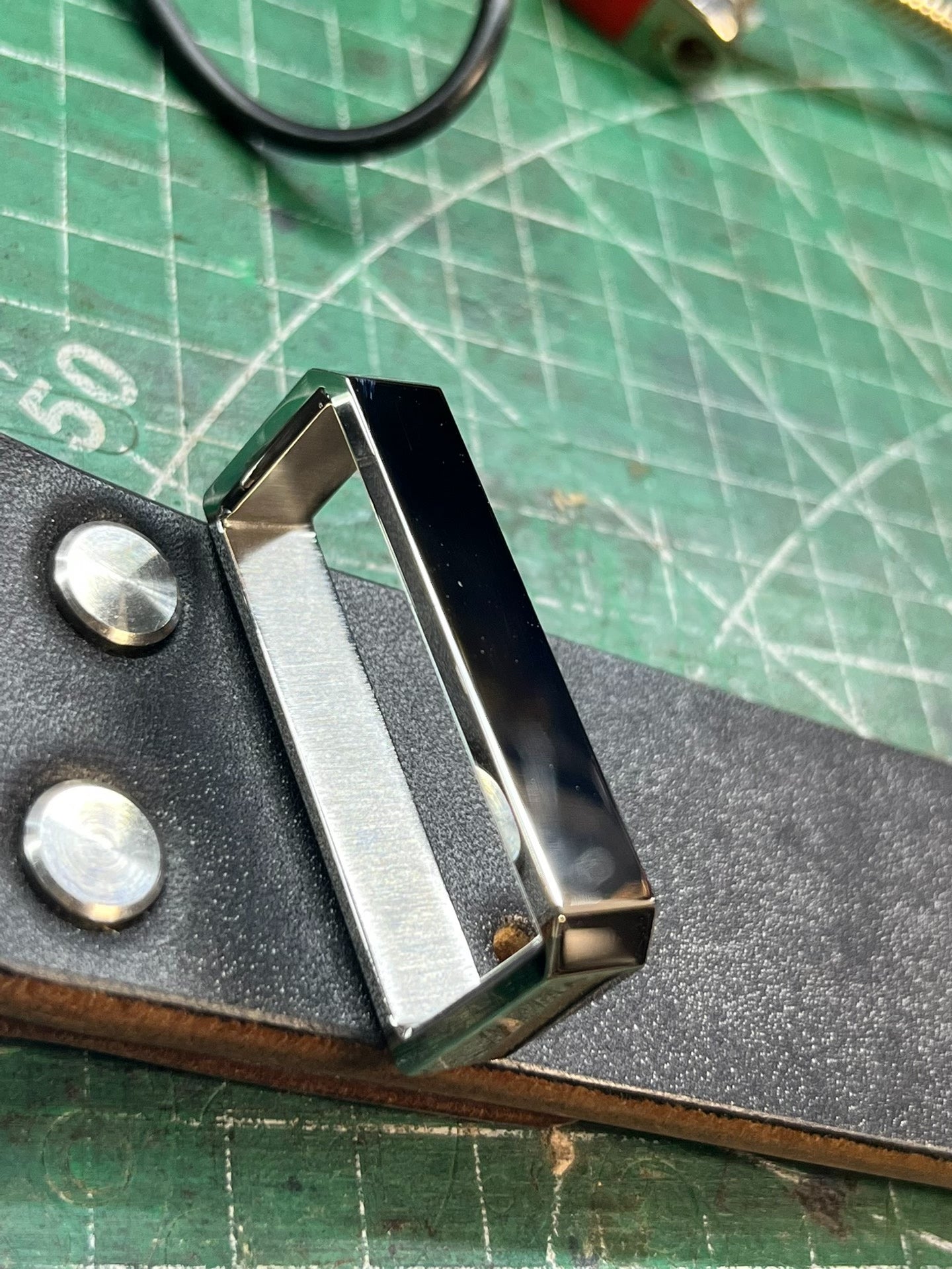 Muchen belt buckle meson