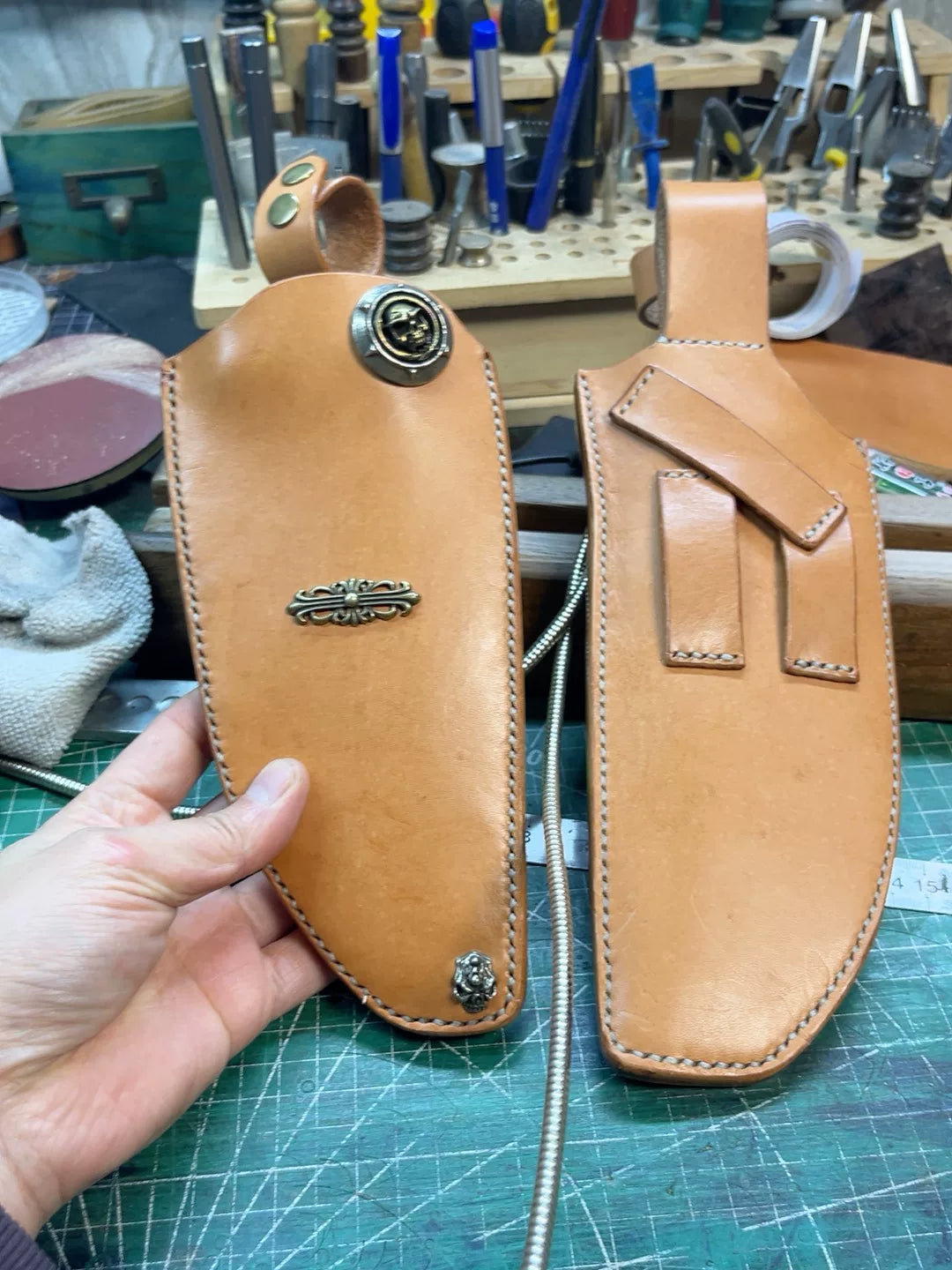 The cowhide scabbard is custom-made and handmade. The customer need…