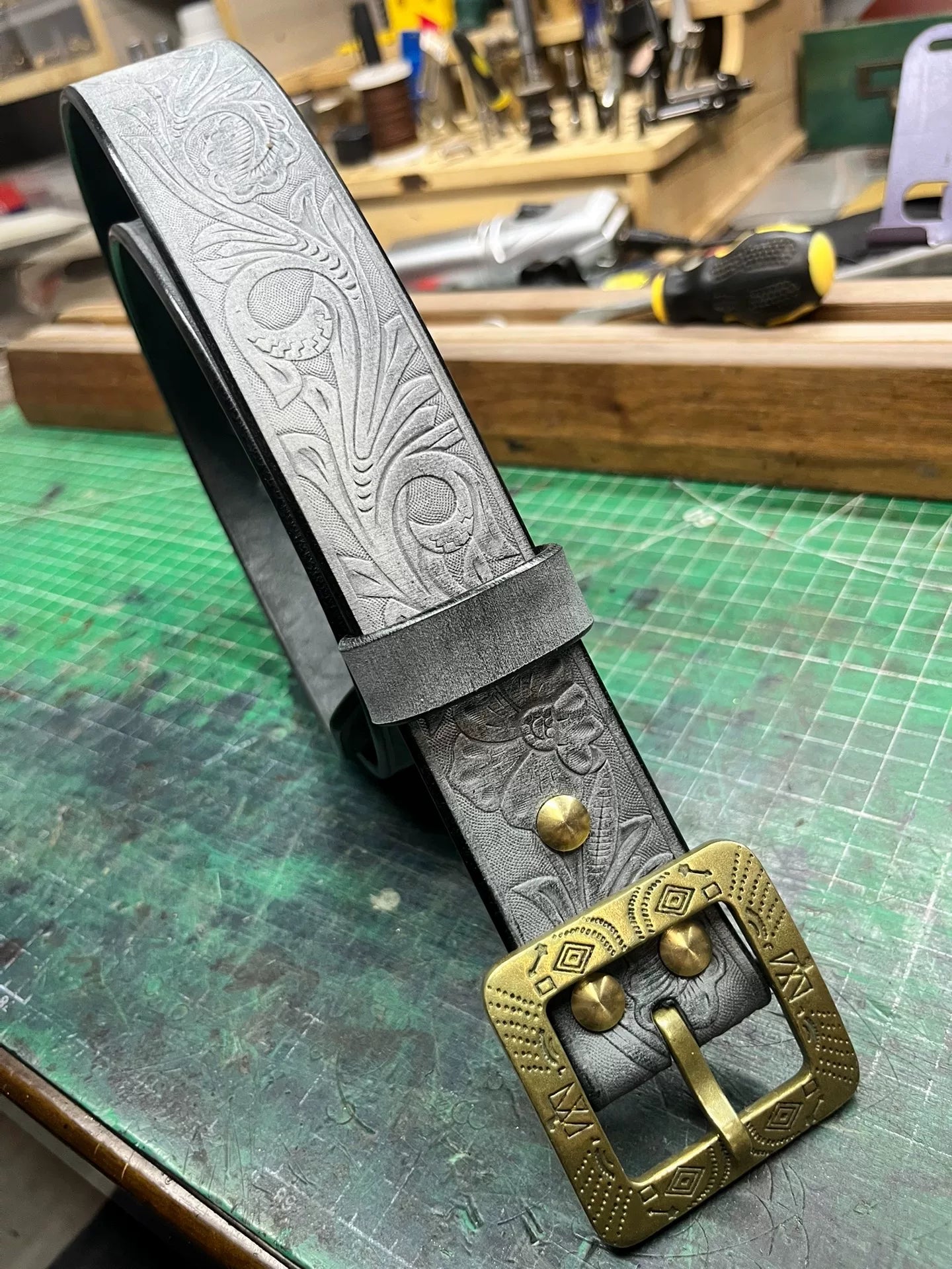 The machine-carved handmade belt of Italian horse-bridle leather is…