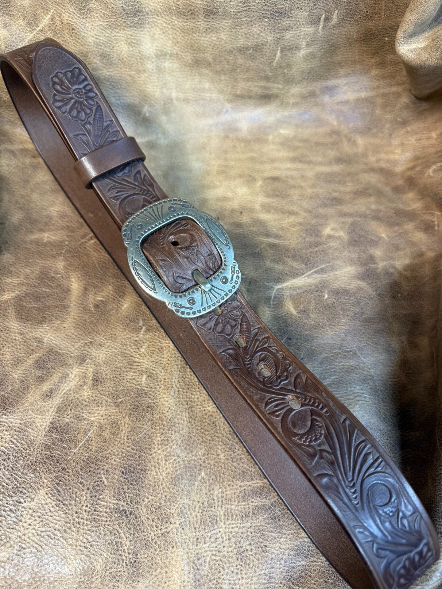 Meian's custom-made brown carved handmade belt