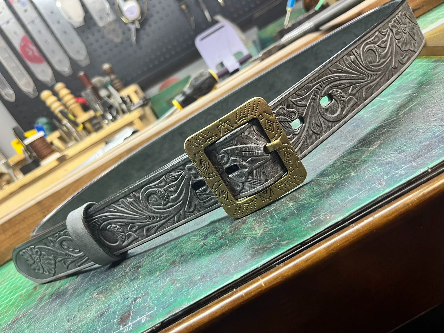 The machine-carved handmade belt of Italian horse-bridle leather is…