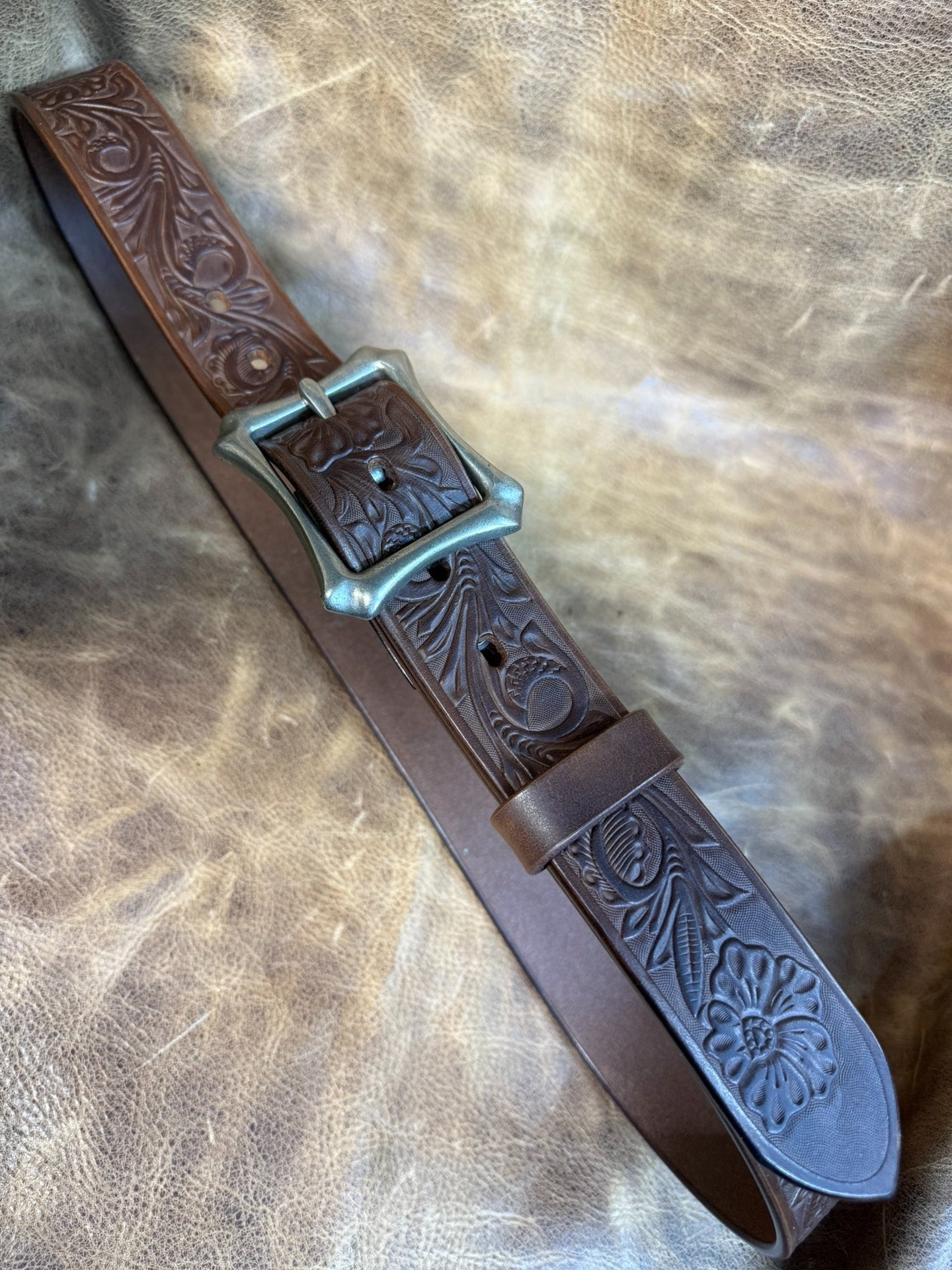 Meian's custom-made brown carved handmade belt