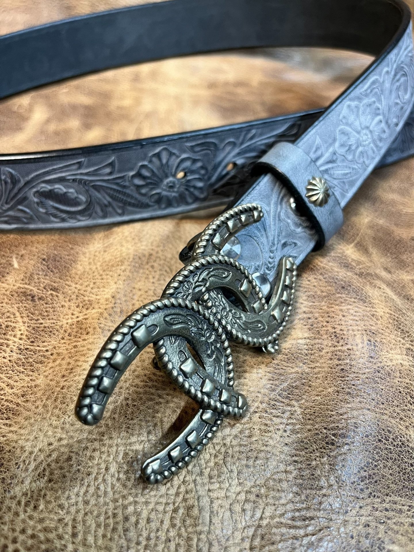So handsome. Black imported full-grain Italian horse-rein carved ge…