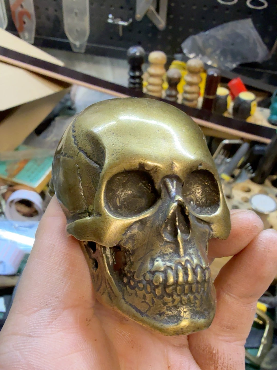 There is only one brass skull belt buckle