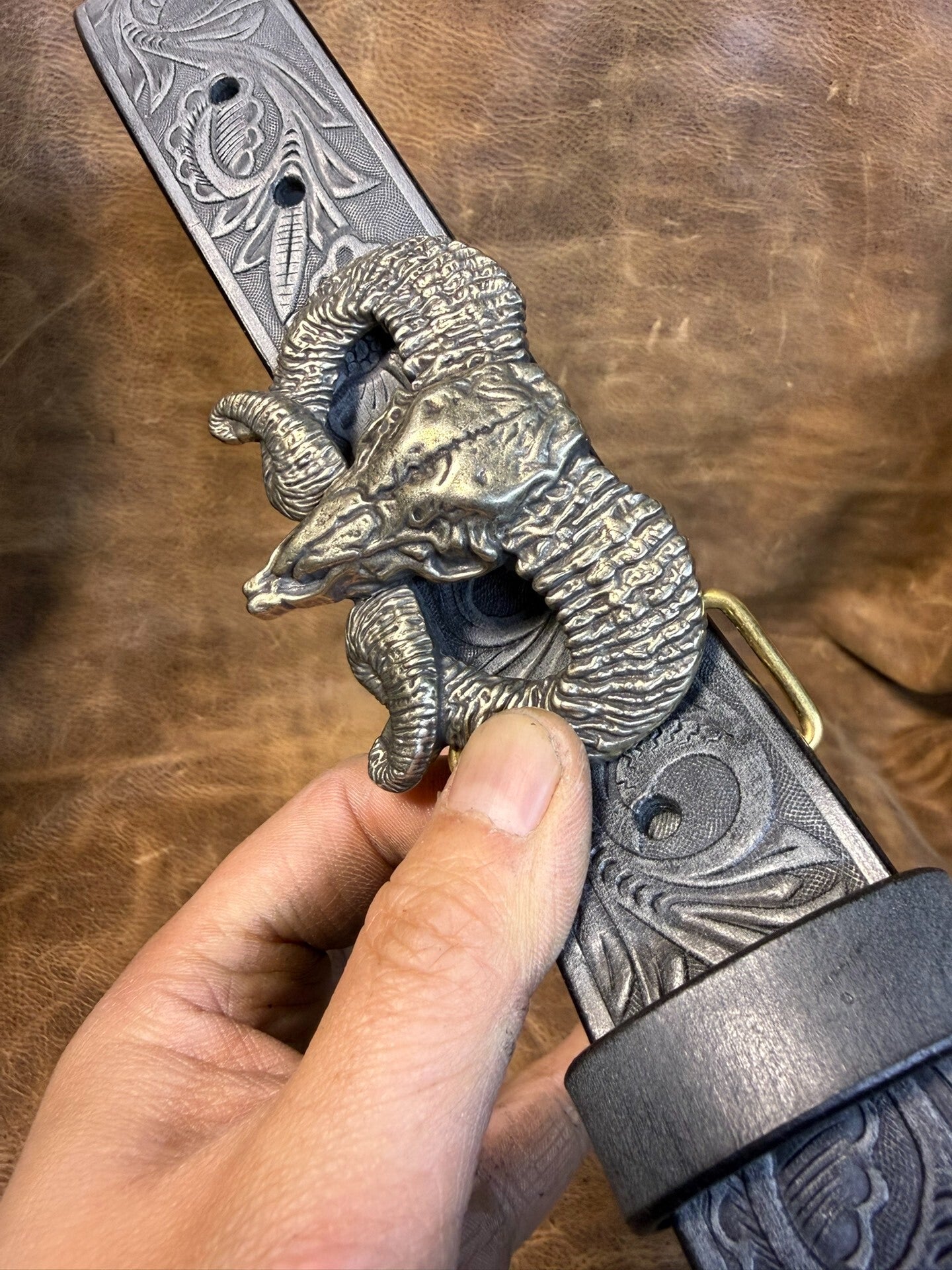 The Italian horse-rein carved handmade belt is custom-made
