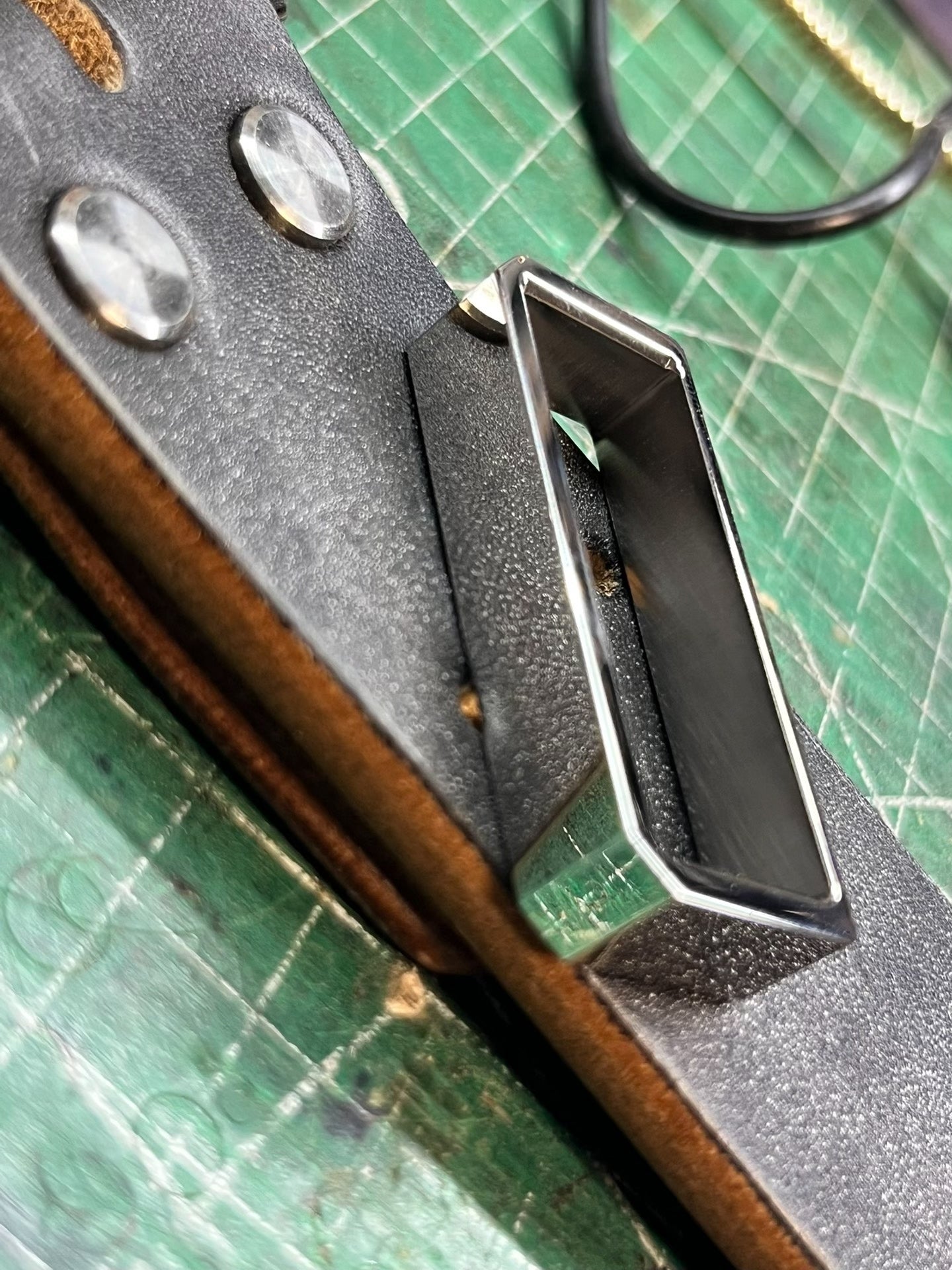 Muchen belt buckle meson