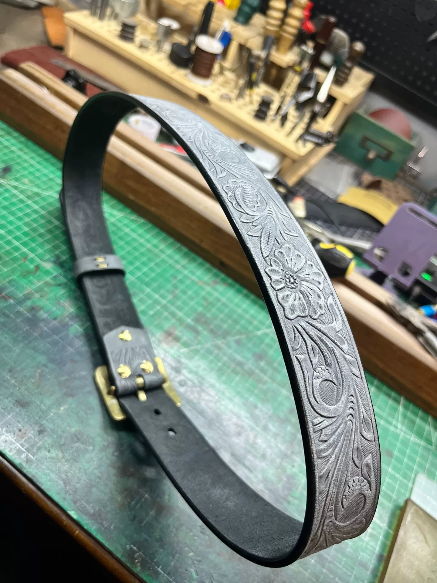 The machine-carved handmade belt of Italian horse-bridle leather is…