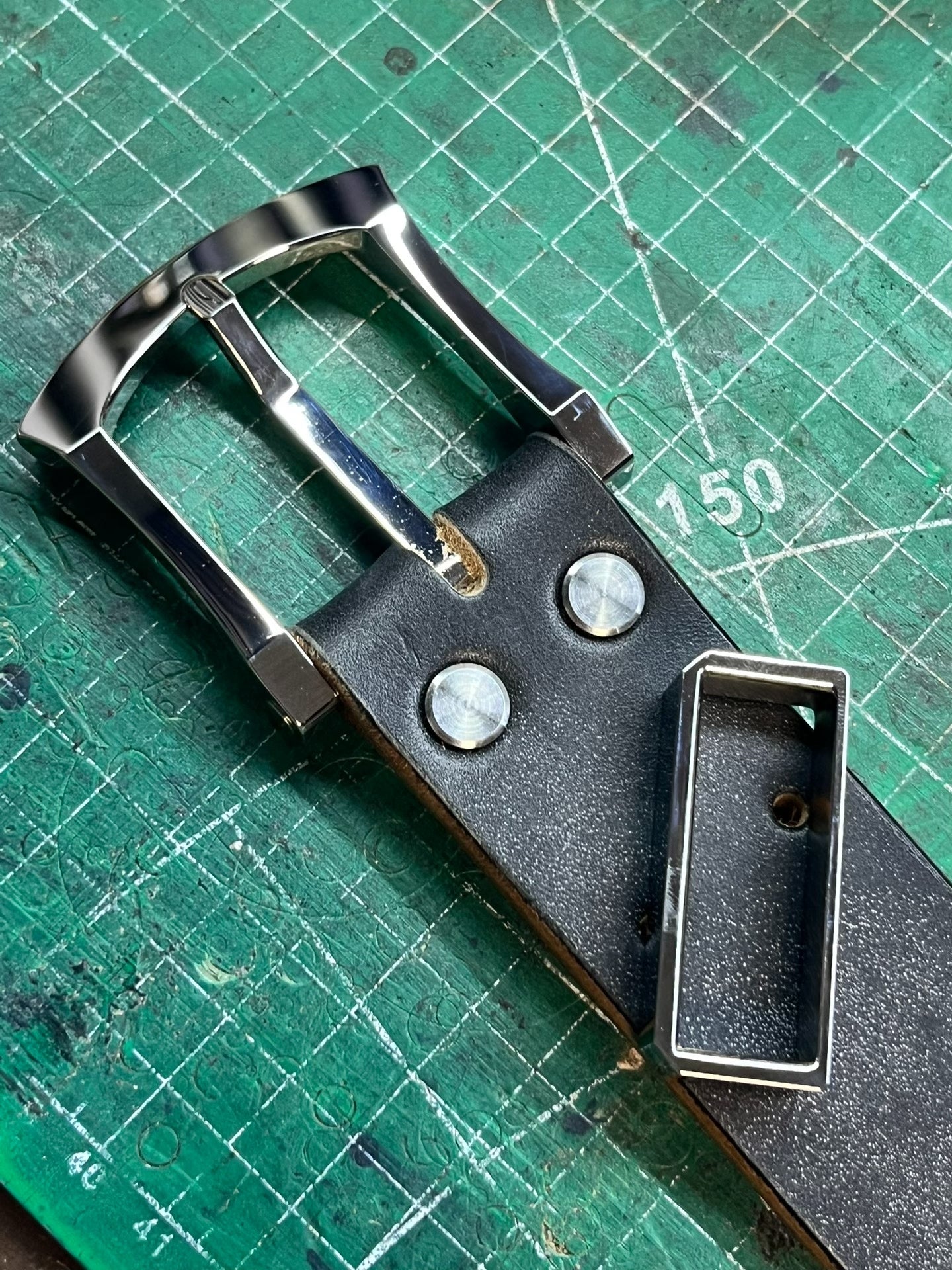 Muchen belt buckle meson