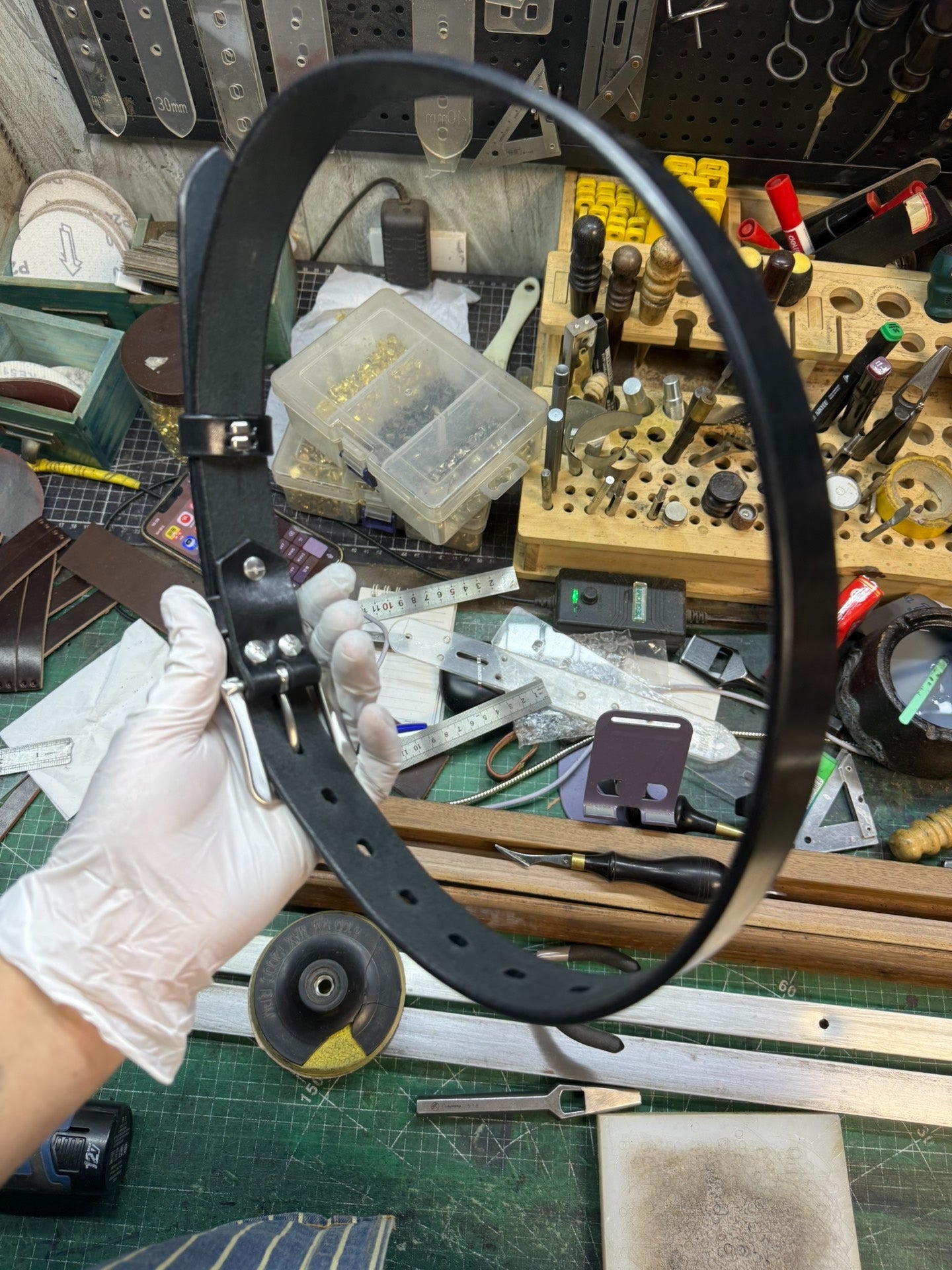 More than a dozen pieces of women's oil-waxed leather belts with sl…