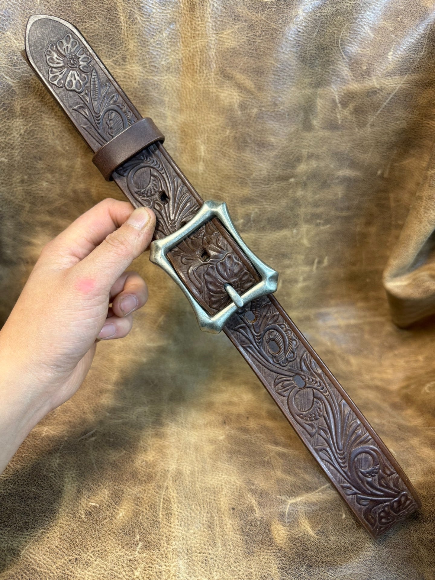 Meian's custom-made brown carved handmade belt