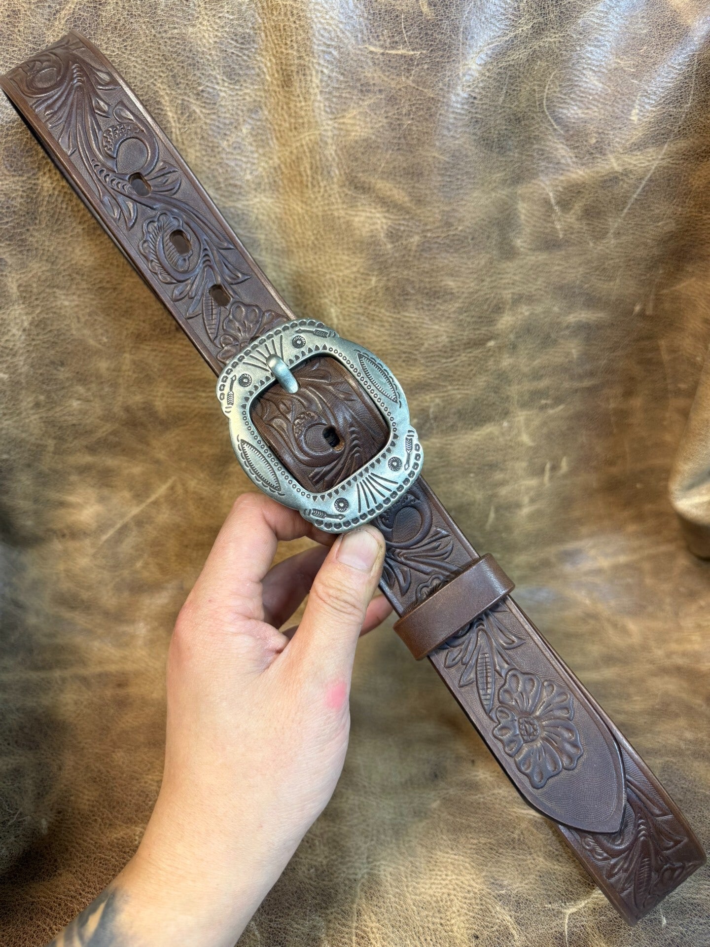 Meian's custom-made brown carved handmade belt