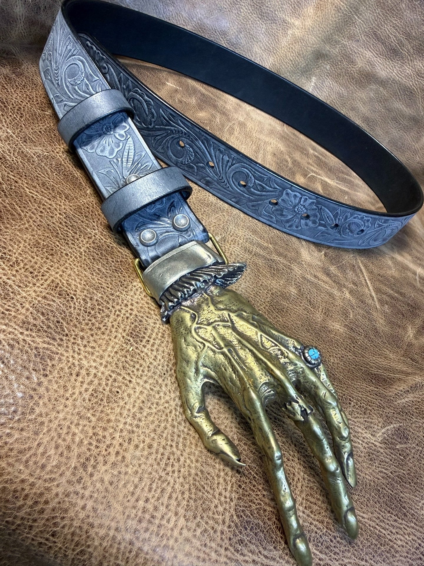 The Italian horse-rein carved handmade belt is custom-made