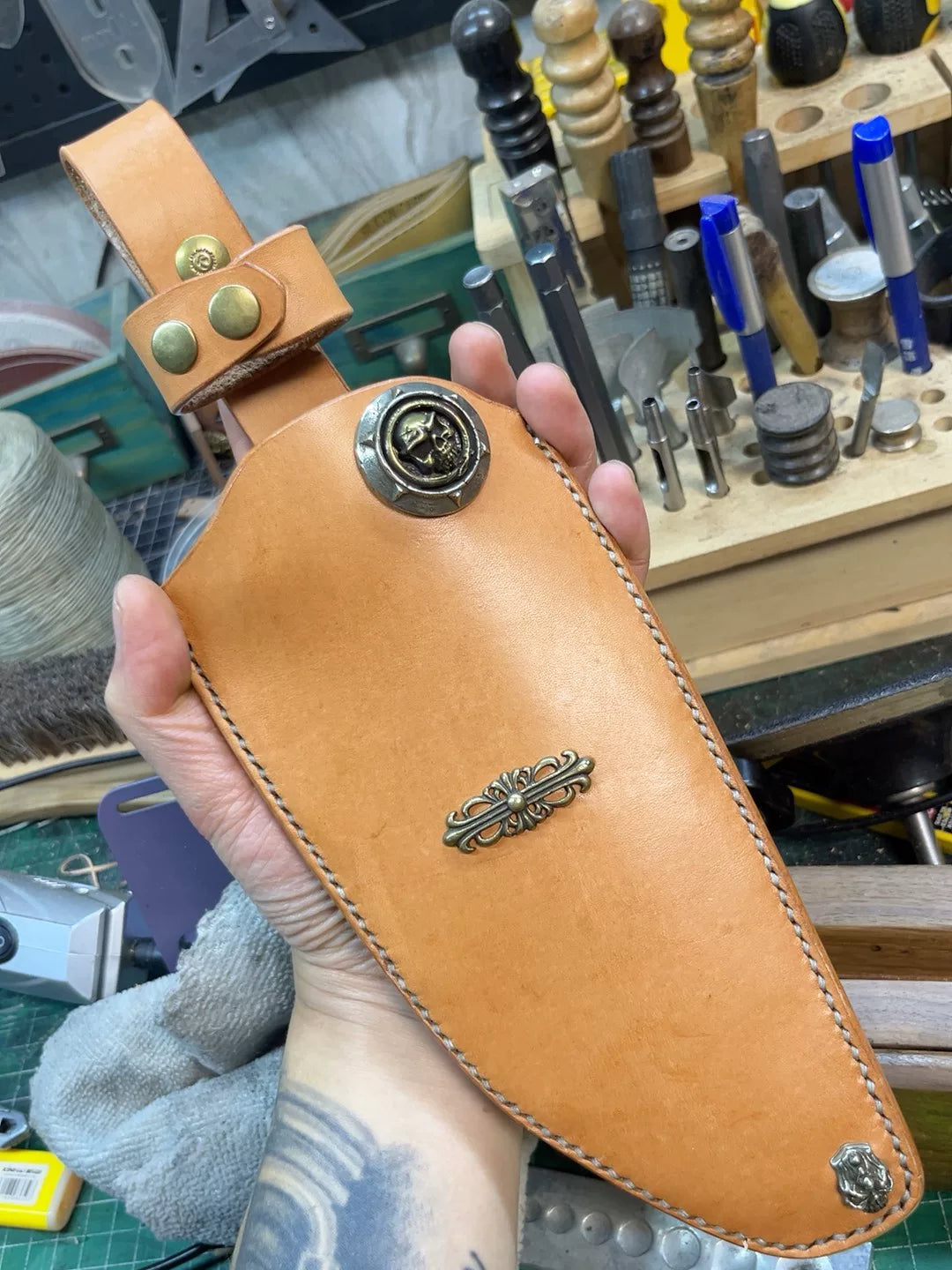 The cowhide scabbard is custom-made and handmade. The customer need…