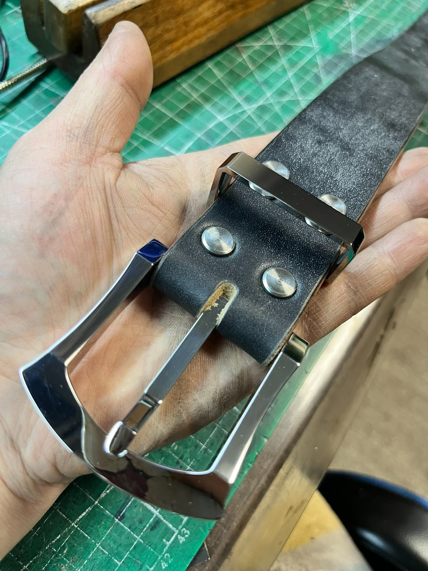 Muchen belt buckle meson