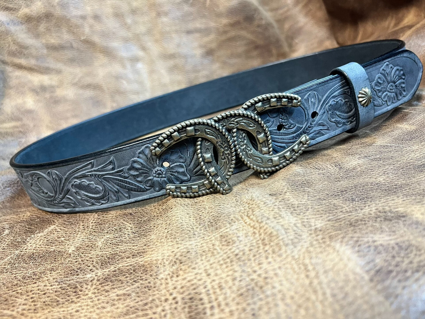 So handsome. Black imported full-grain Italian horse-rein carved ge…