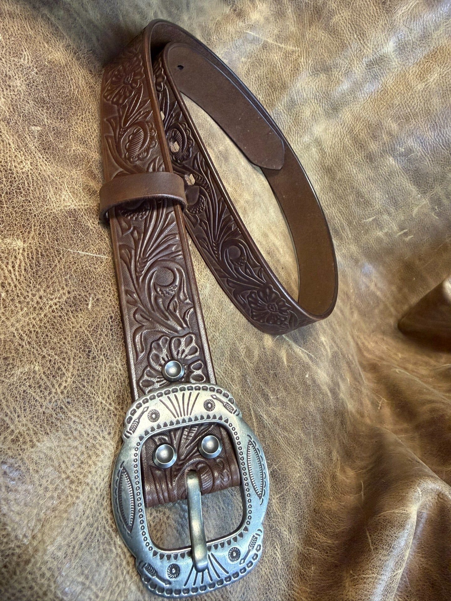 Meian's custom-made brown carved handmade belt