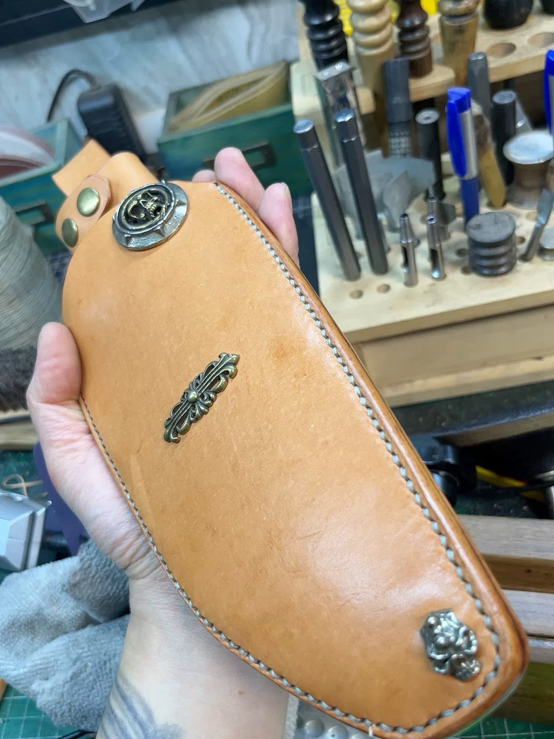 The cowhide scabbard is custom-made and handmade. The customer need…